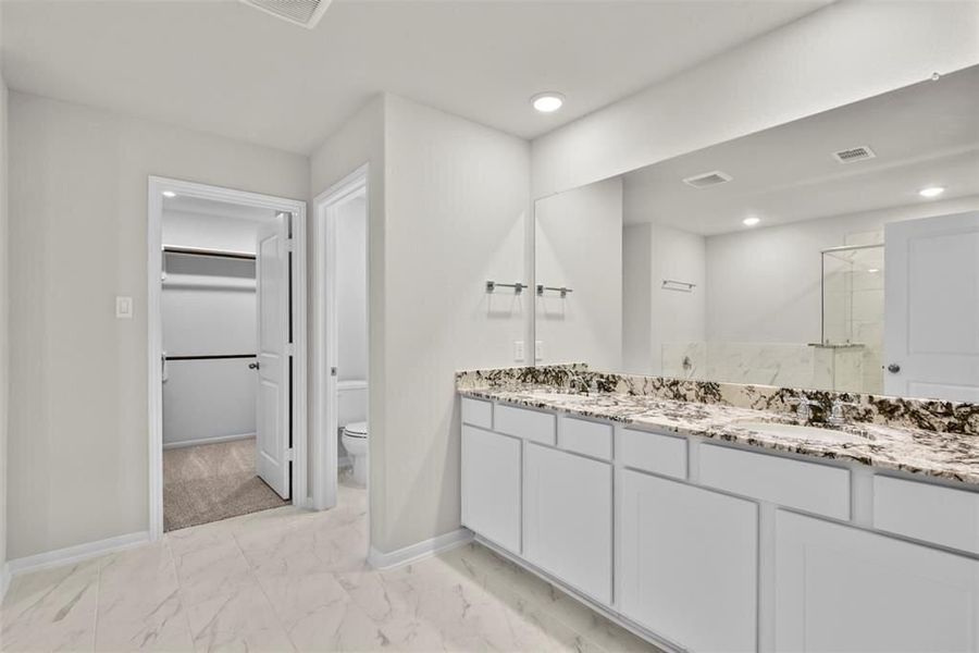 Furnished interior view inside a new home in Sunterra, Katy (Image 28). Furnished interior view inside a new home in Sunterra, Katy (Image 28).