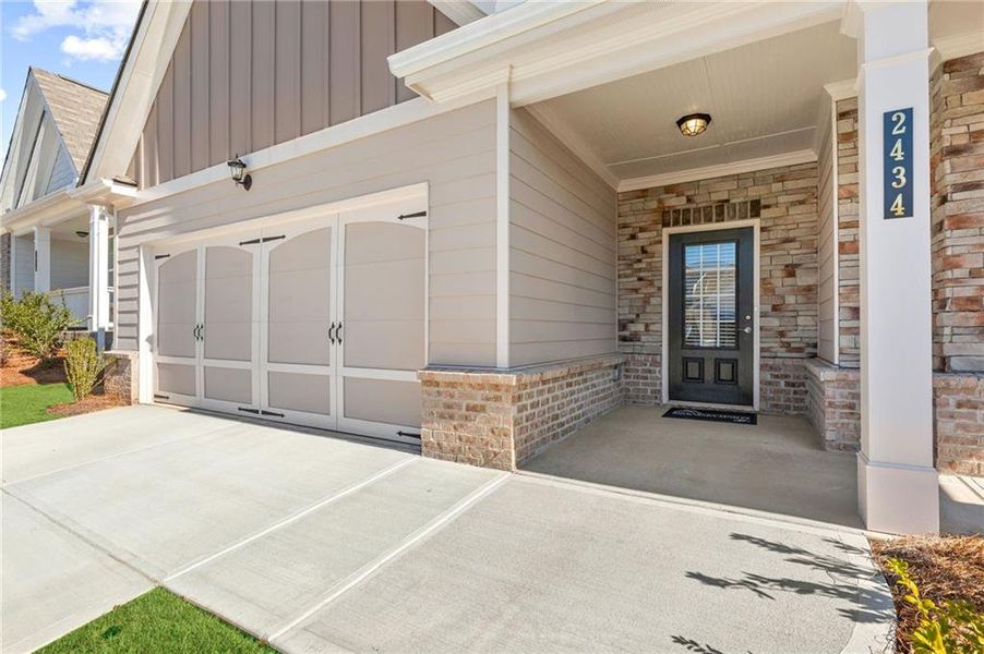 Exterior details and patio area of a home in Cooper's Walk, Loganville (Image 3).