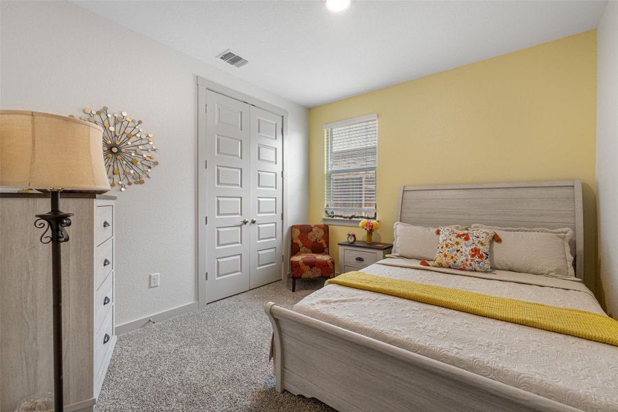 Bedroom with carpet floors and a closet Bedroom with carpet floors and a closet