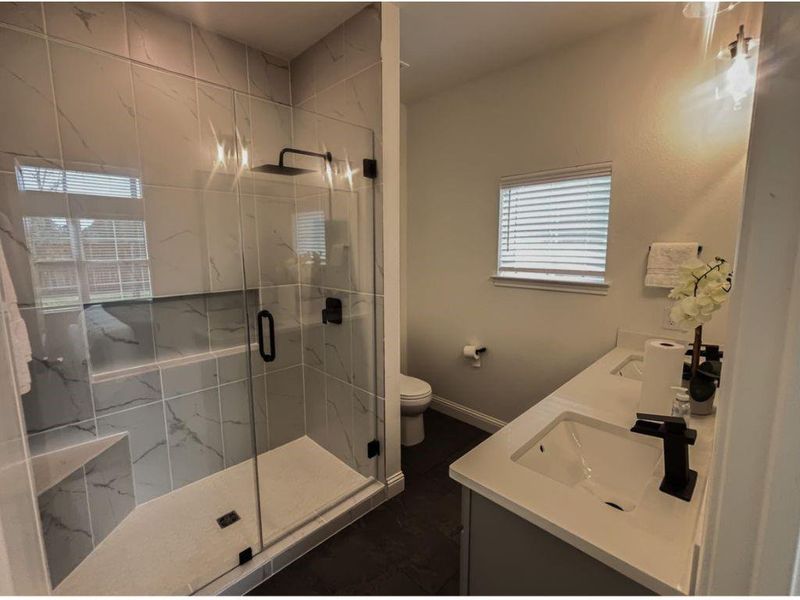 Furnished interior view inside a new home in Spring Branch Crossing, Conroe (Image 9).