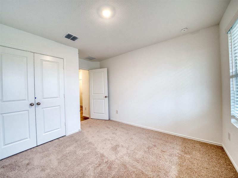 Spacious, unfurnished interior of a new home in Waterstone, Kyle (Image 22).