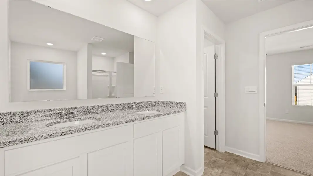 Furnished interior view inside a new home in Highland Hills, Graniteville (Image 13).