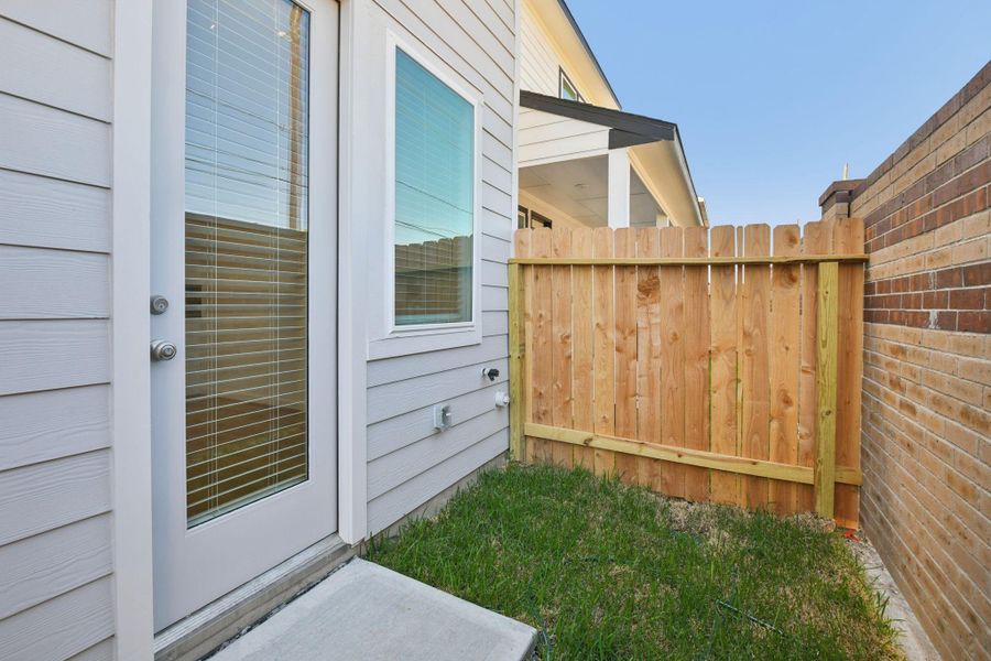 Exterior details and patio area of a home in Spring Brook Village - City Series, Houston (Image 21).