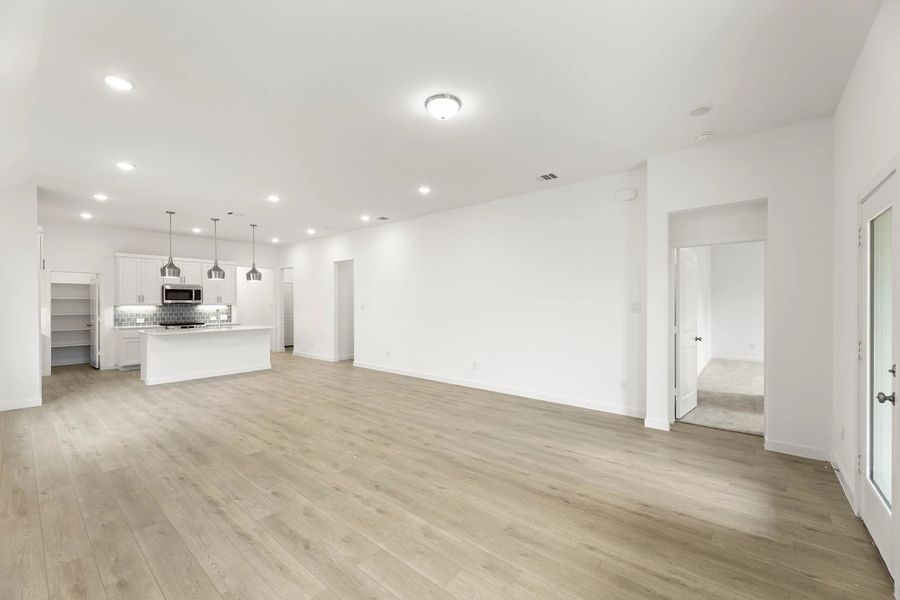 Open Kitchen-Living-Dining Room featuring the Coastal Collection