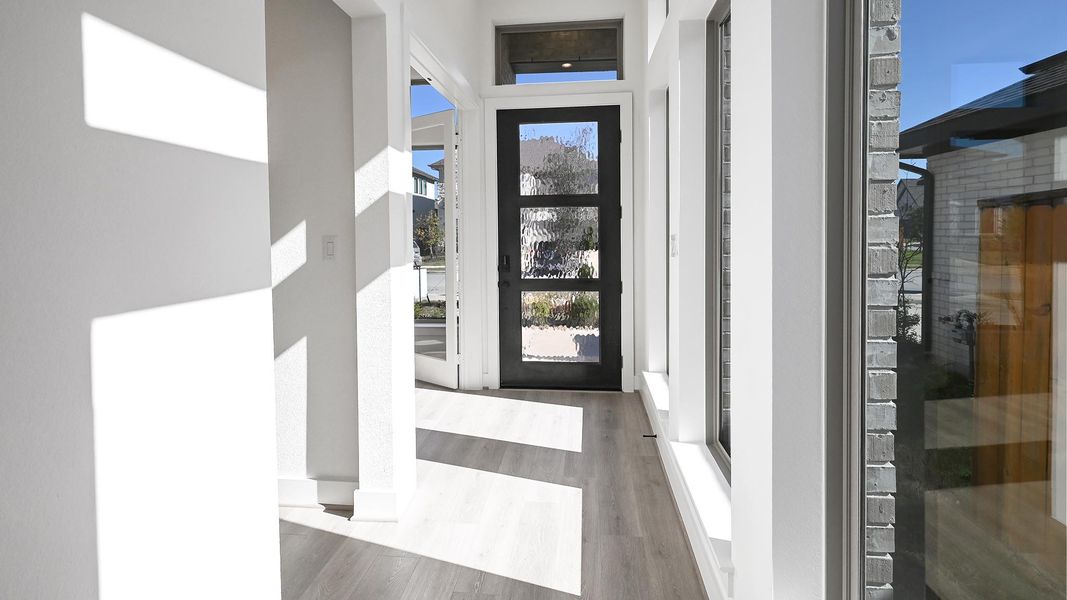 Exterior details and patio area of a home in Crosswinds 50', Kyle (Image 3).