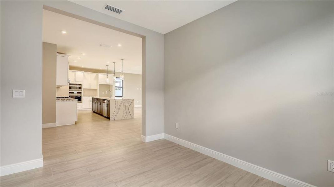 Spacious, unfurnished interior of a new home in Woodland Preserve, Parrish (Image 17).