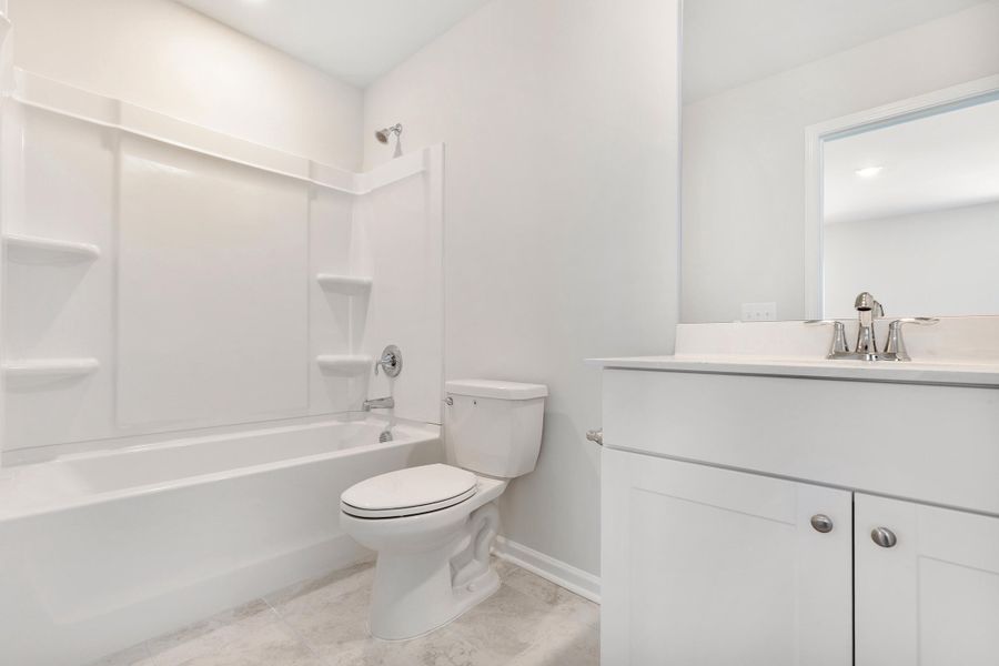 Furnished interior view inside a new home in Sweetgrass at Summers Corner, Summerville (Image 4).