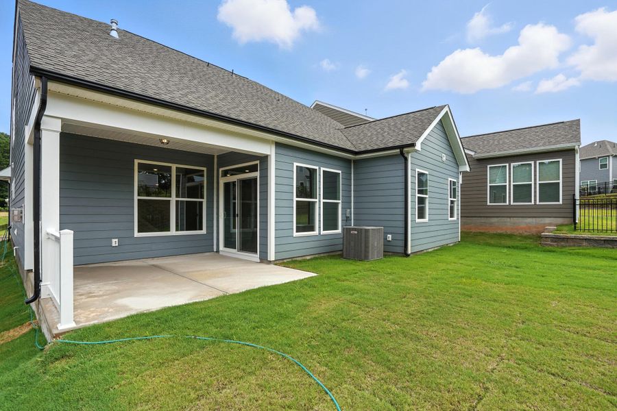 Front exterior of a new home in Villas at Prestwick, Mooresville, NC, highlighting curb appeal (Image 21).