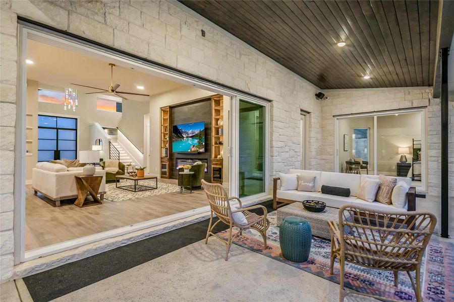 View of patio / terrace with an outdoor living space with a fire pit View of patio / terrace with an outdoor living space with a fire pit