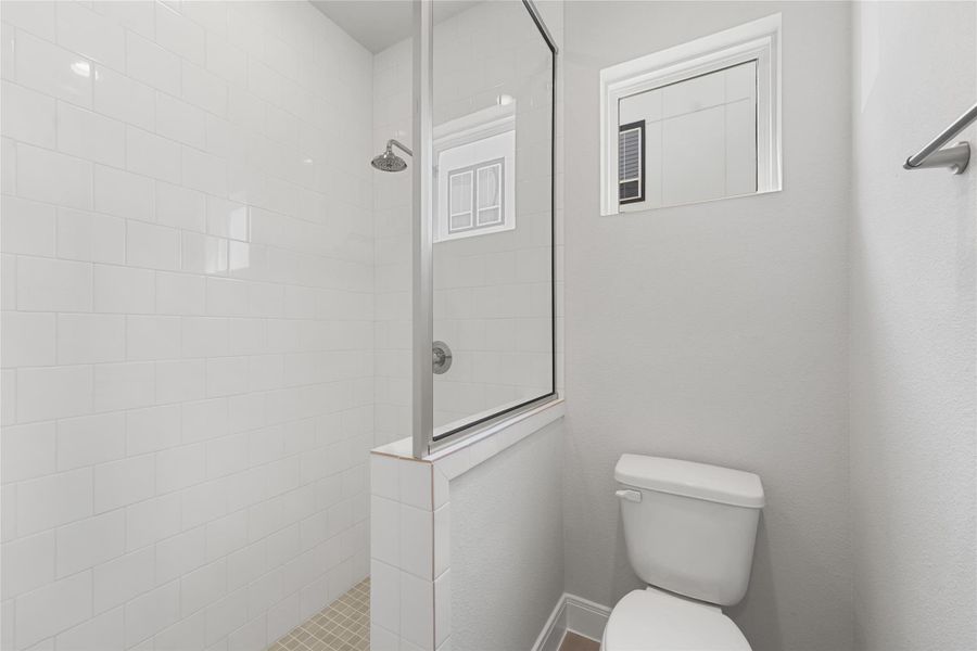 Furnished interior view inside a new home in The Corner At Buffalo Pointe, Houston (Image 12).