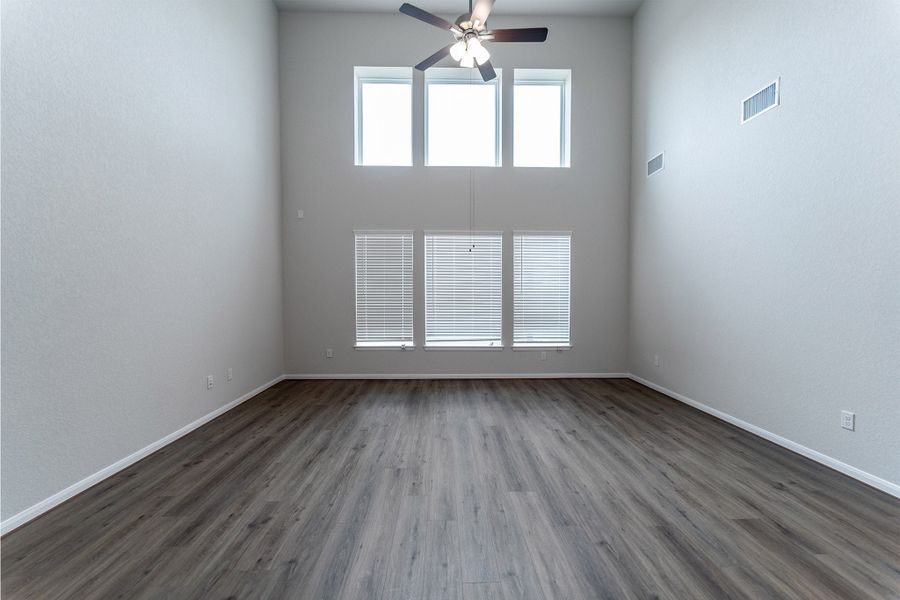 Spacious, unfurnished interior of a new home in The Woodlands at Medina Hills, Mico (Image 14).