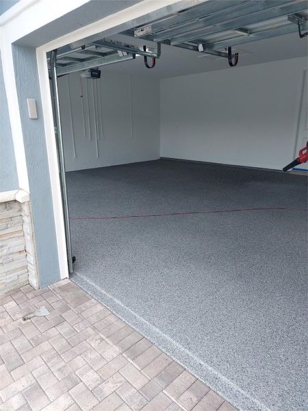 Over sized 3 car garage with professional Epoxy coating