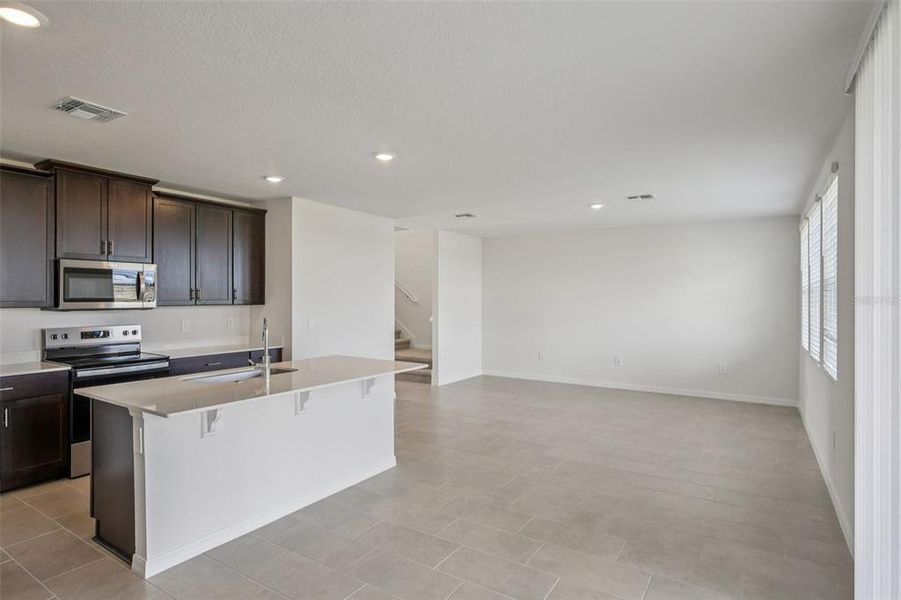 Furnished interior view inside a new home in Springs at Lake Alfred - Classic Series, Lake Alfred (Image 17).
