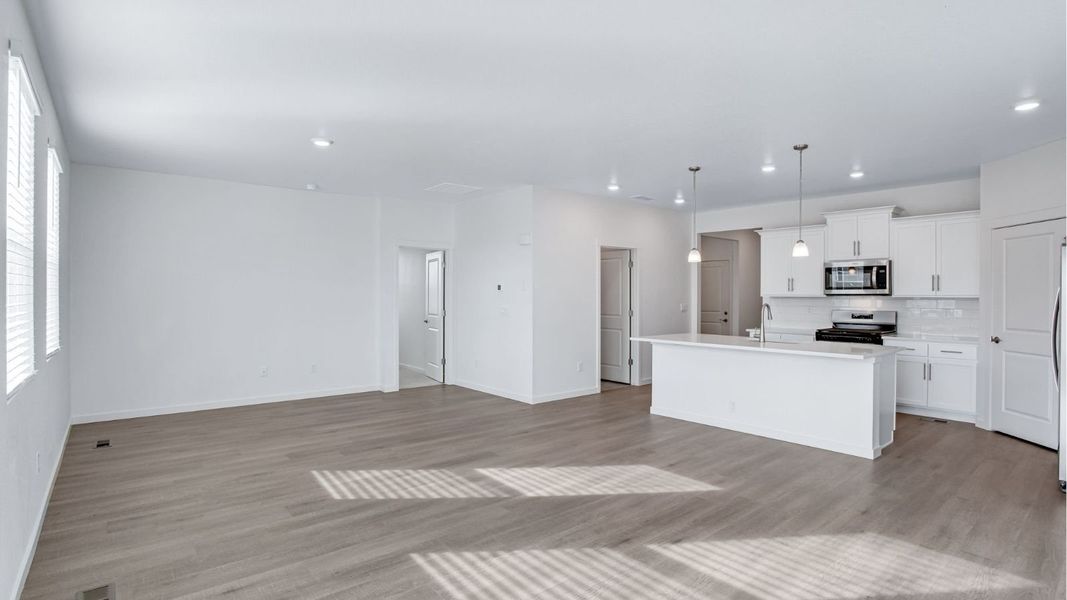 Representative unfurnished interior of a home built from the Newcastle by D.R. Horton in Tailholt, Severance (Image 8).