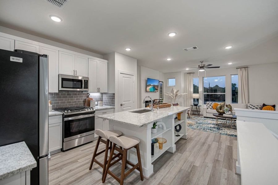 Furnished interior view inside a new home in Centero at Stone Oak, San Antonio (Image 9). Furnished interior view inside a new home in Centero at Stone Oak, San Antonio (Image 9).