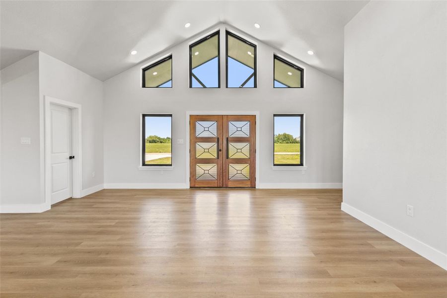 Spacious North facing entry welcomes you inside, while abundant windows fill the home with natural light throughout the day.