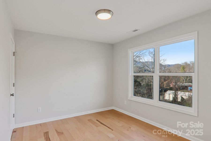 Spacious, unfurnished interior of a new home in , Candler (Image 35).