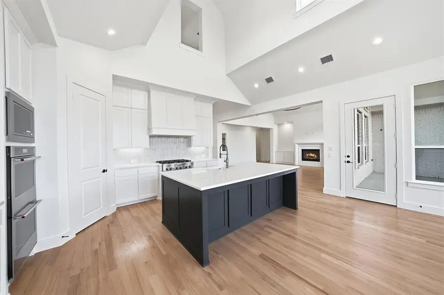 Furnished interior view inside a new home in Light Farms Graham/Reagan, Celina (Image 8).