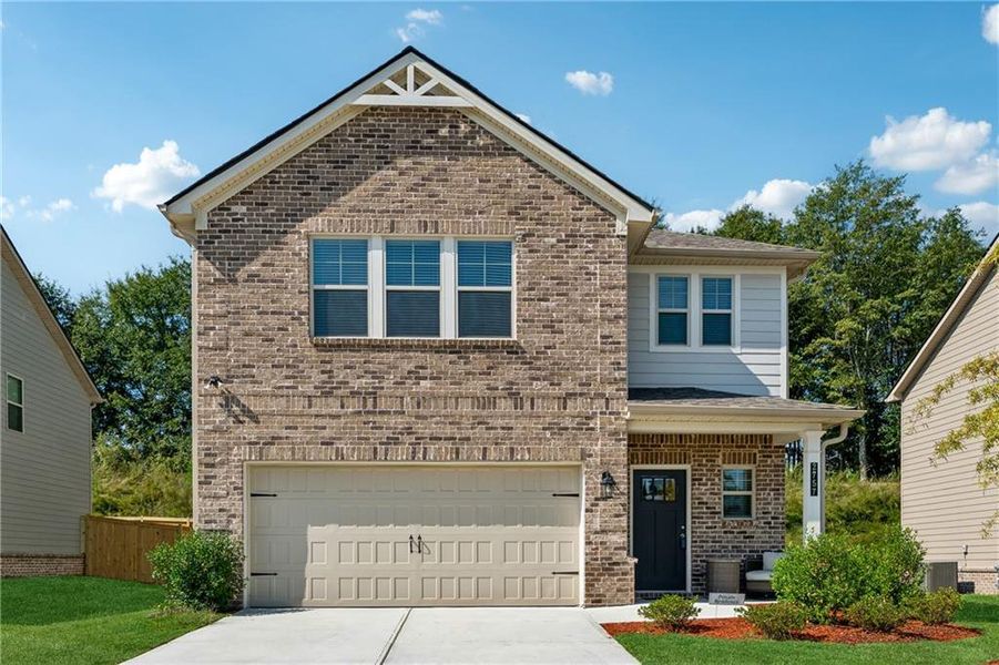 Front exterior of a new home in Bracknell, Loganville, GA, highlighting curb appeal (Image 1). Front exterior of a new home in Bracknell, Loganville, GA, highlighting curb appeal (Image 1).