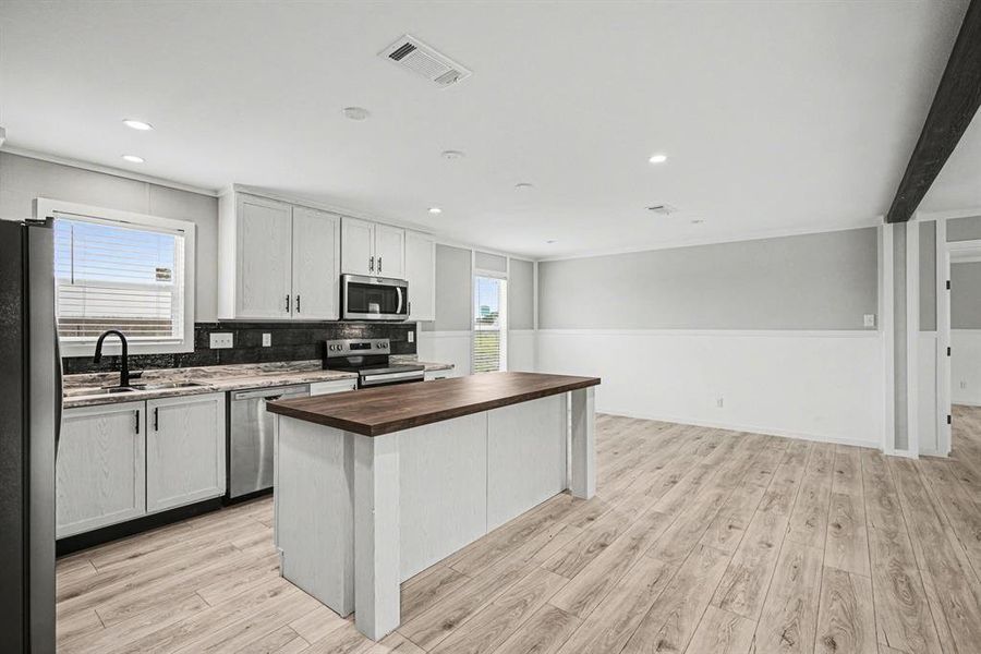 Open-concept kitchen. - open to dining area and living room.