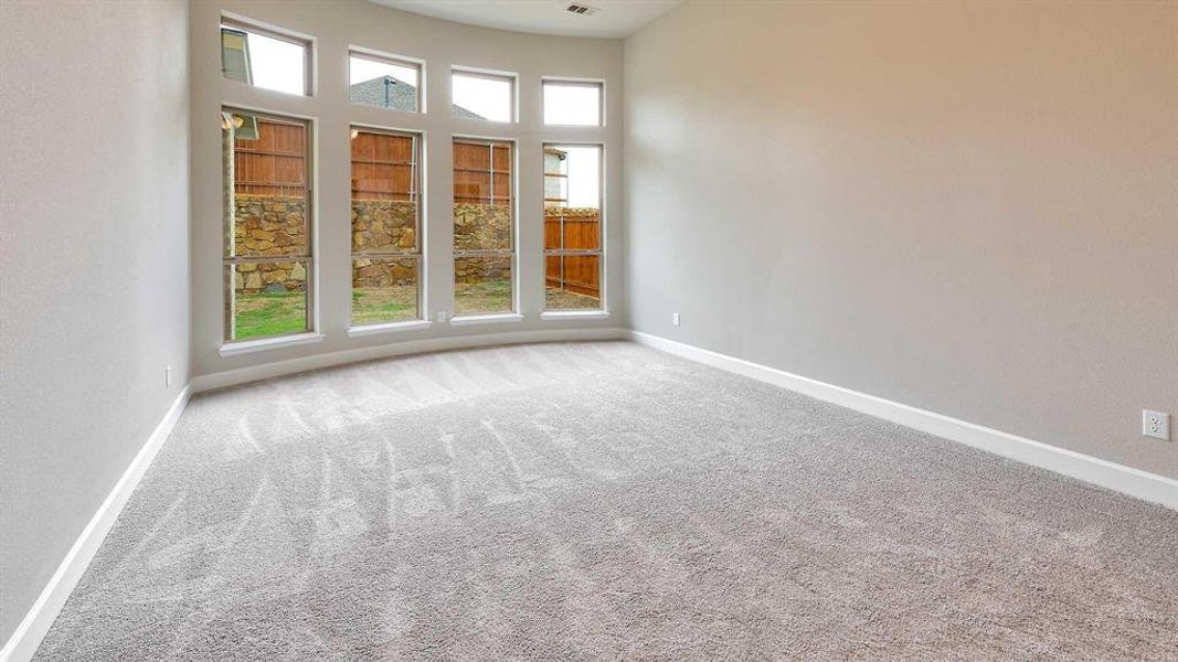 View of carpeted spare room