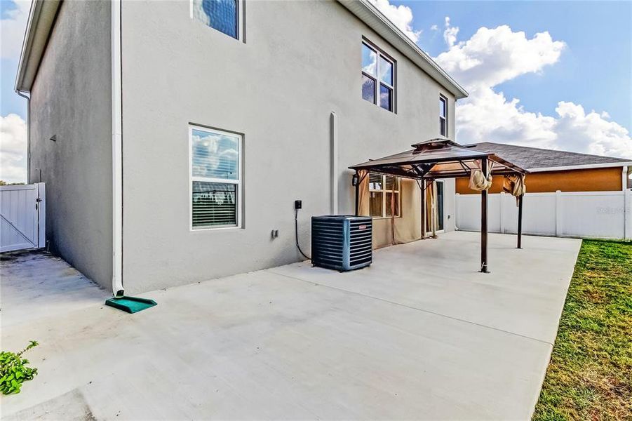 Exterior details and patio area of a home in Lakes at Laurel Highlands, Lakeland (Image 4).