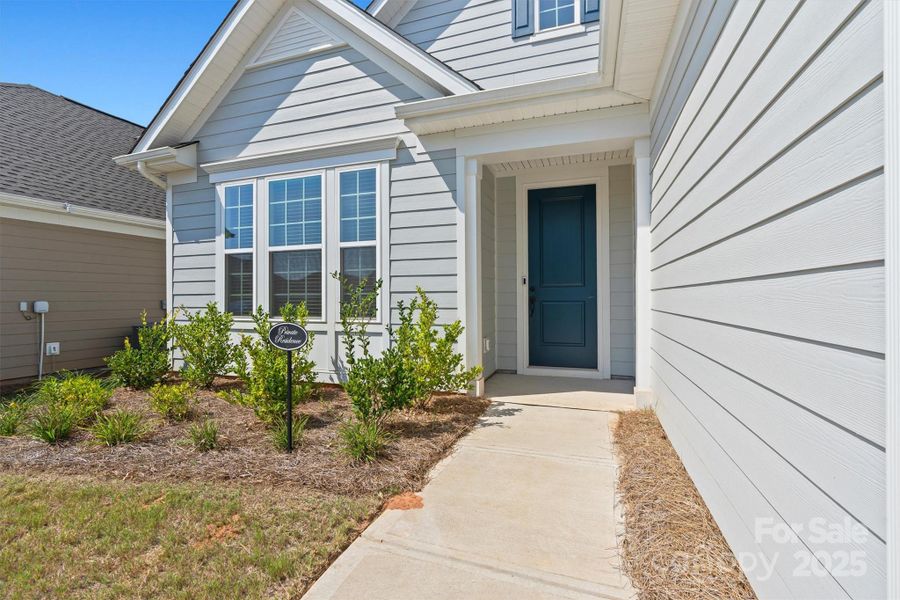 Front exterior of a new home in , Charlotte, NC, highlighting curb appeal (Image 1). Front exterior of a new home in , Charlotte, NC, highlighting curb appeal (Image 1).