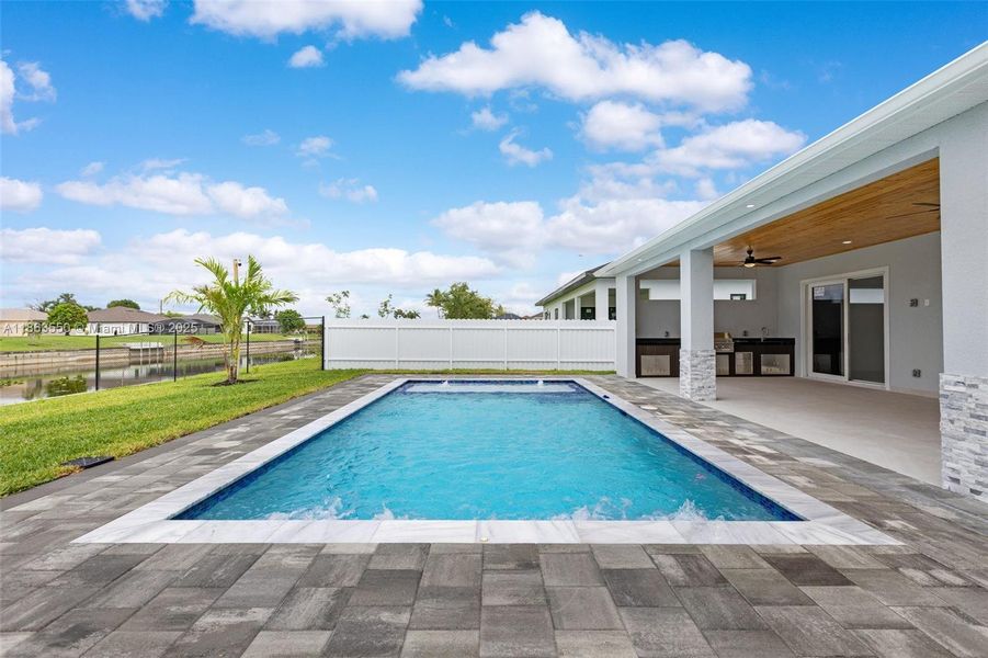 Front exterior of a new home in , Cape Coral, FL, highlighting curb appeal (Image 24). Front exterior of a new home in , Cape Coral, FL, highlighting curb appeal (Image 24).