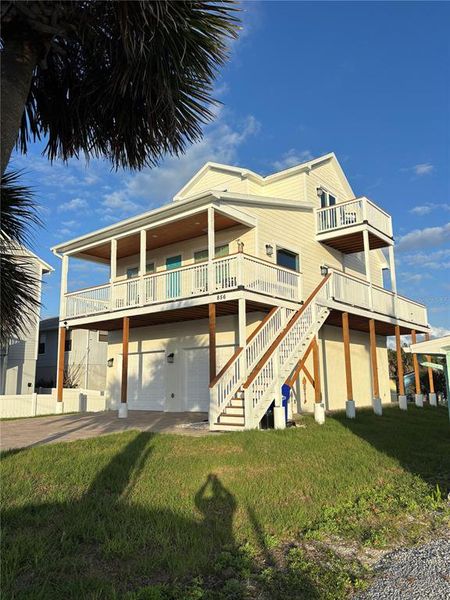 Exterior details and patio area of a home in , New Smyrna Beach (Image 32).