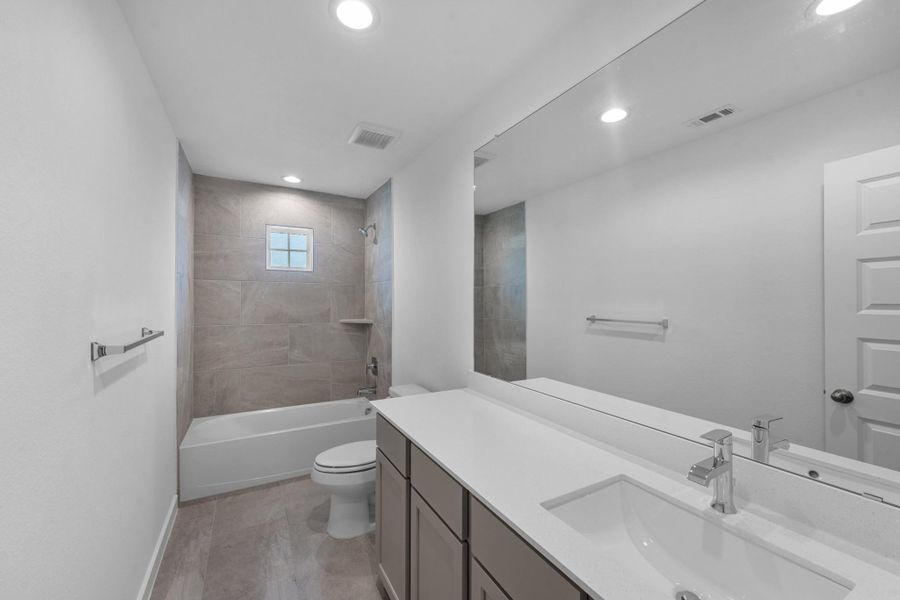 Furnished interior view inside a new home in Grand Mason Crossing, Katy (Image 14).