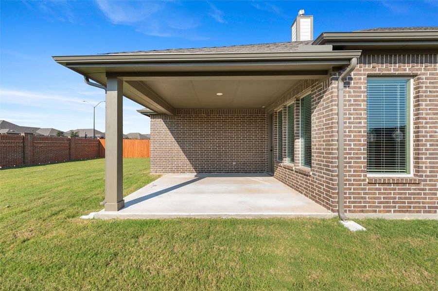Exterior details and patio area of a home in Northstar, Haslet (Image 21).