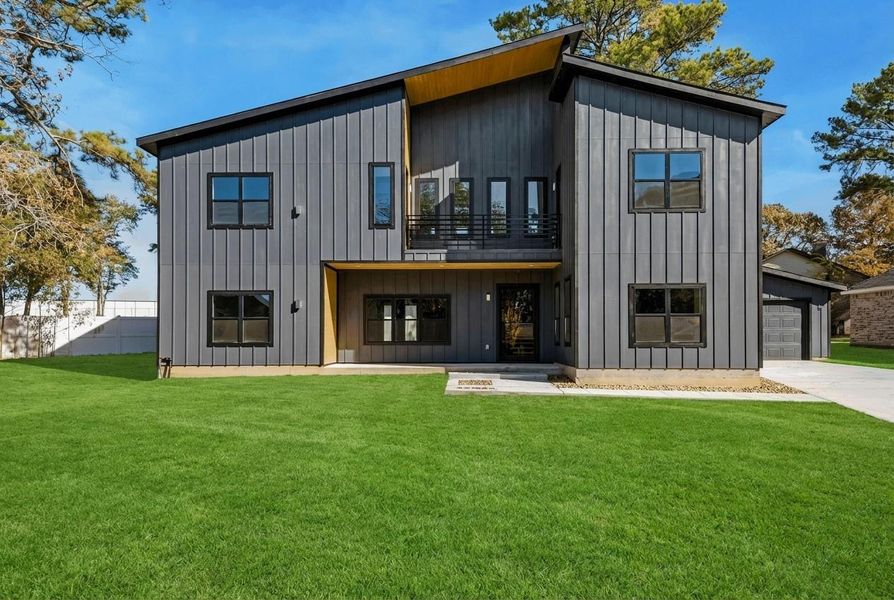 Front exterior of a new home in , Willis, TX, highlighting curb appeal (Image 27).