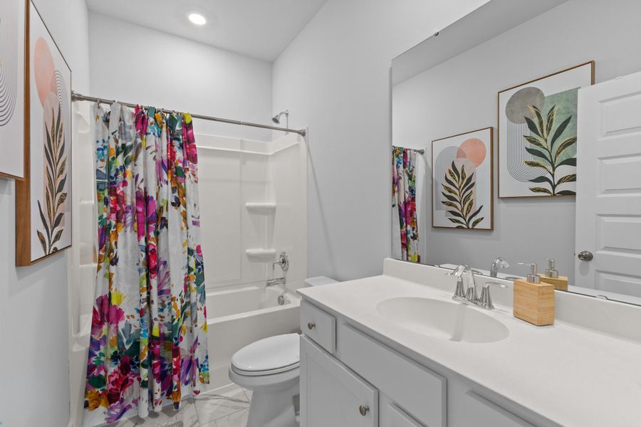 Furnished interior view inside a new home in Sweetgrass at Summers Corner, Summerville (Image 19).