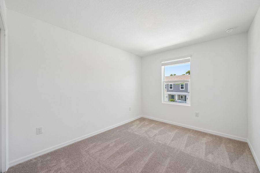 Spacious, unfurnished interior of a new home in The Towns at Tiburon, Nokomis (Image 12).
