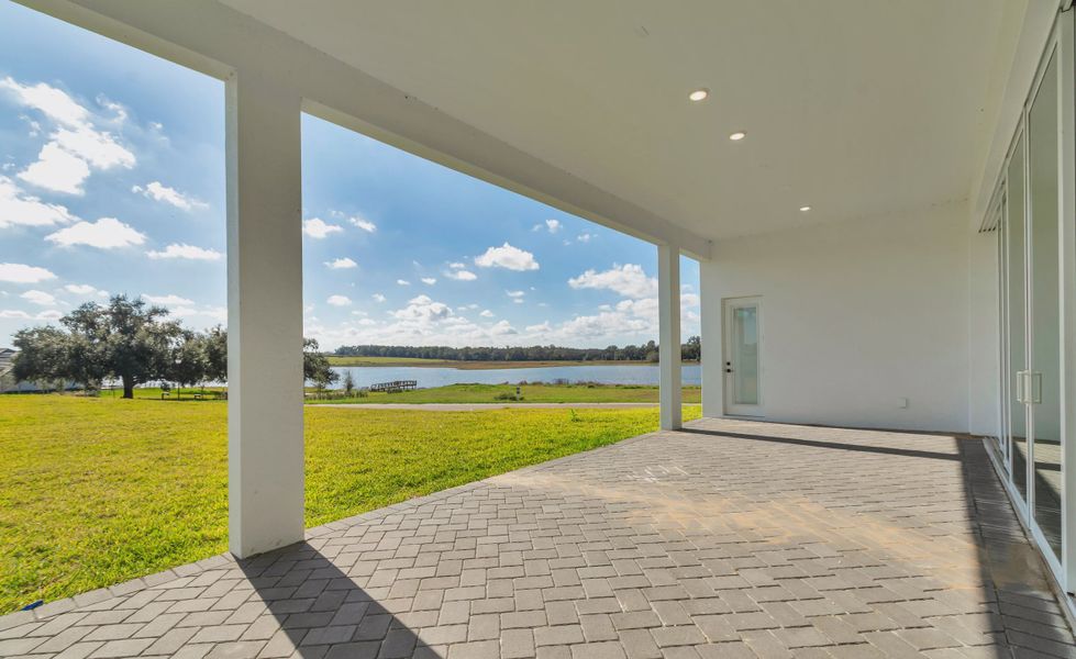 Exterior details and patio area of a home in West Hill Estates, Dade City (Image 20).