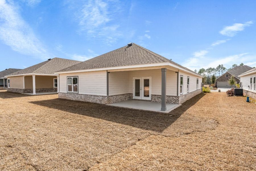Exterior details and patio area of a home in Natureview, Freeport (Image 23).