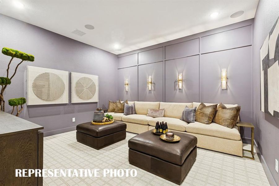 Whether you are hosting family movie night or big game day parties, this main floor media room is the place to be!  REPRESENTATIVE PHOTO