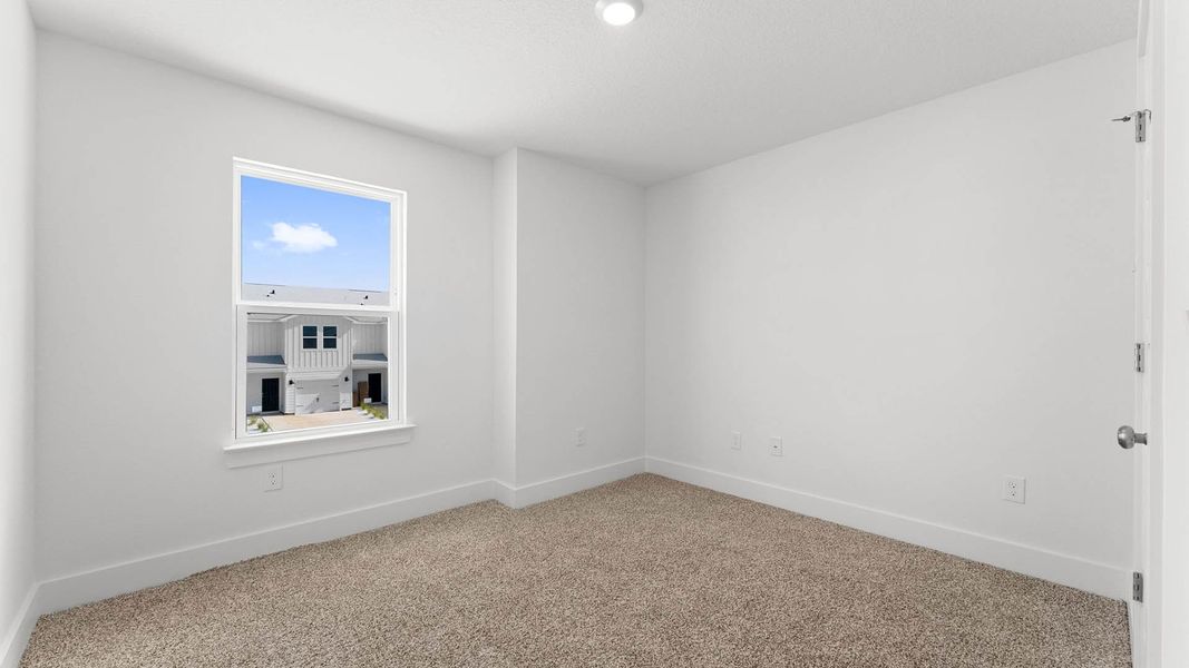 Spacious, unfurnished interior of a new home in Chateau Nemours, Port Saint Joe (Image 27).