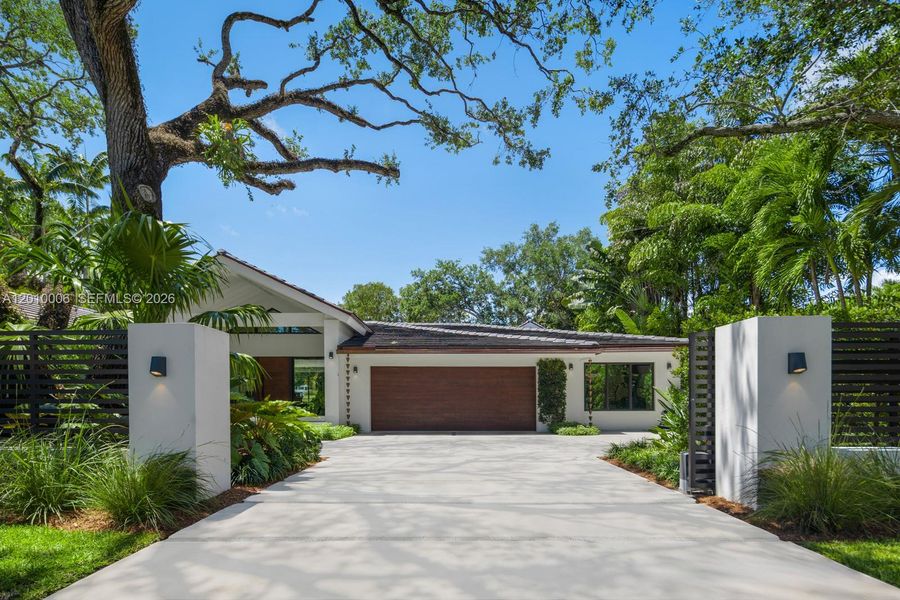 Front exterior of a new home in , Coral Gables, FL, highlighting curb appeal (Image 2).
