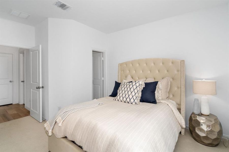 Bedroom featuring hardwood / wood-style flooring