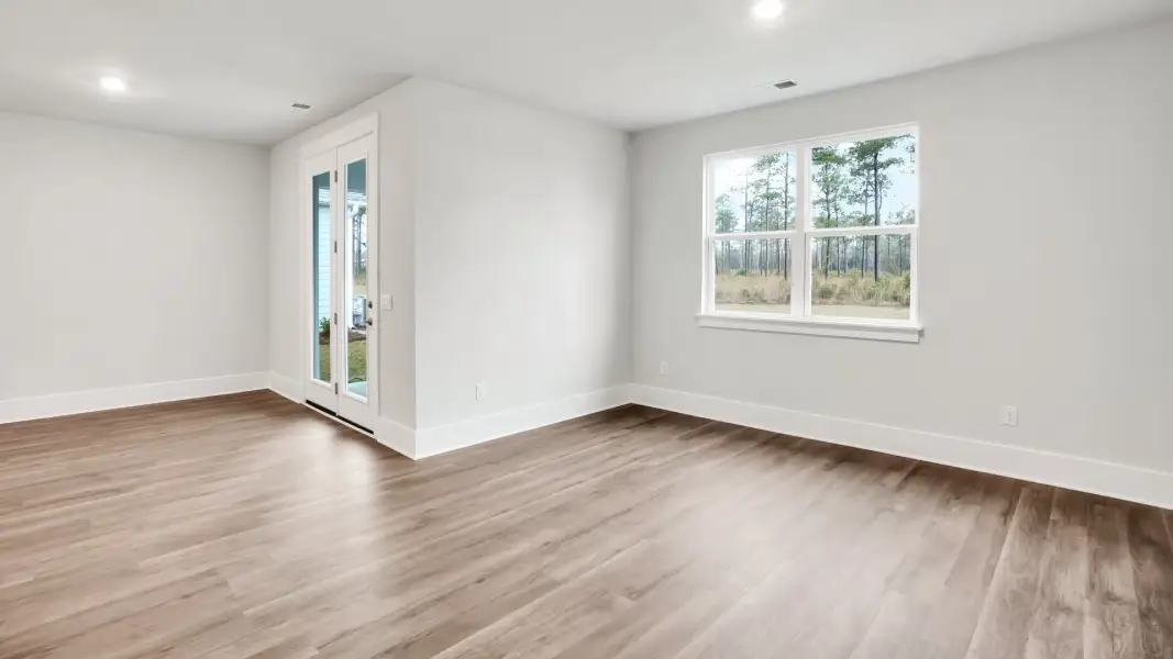 Representative unfurnished interior of a home built from the Claiborne by D.R. Horton in The Highlands at Cedar Hill Landing, Navassa (Image 20).