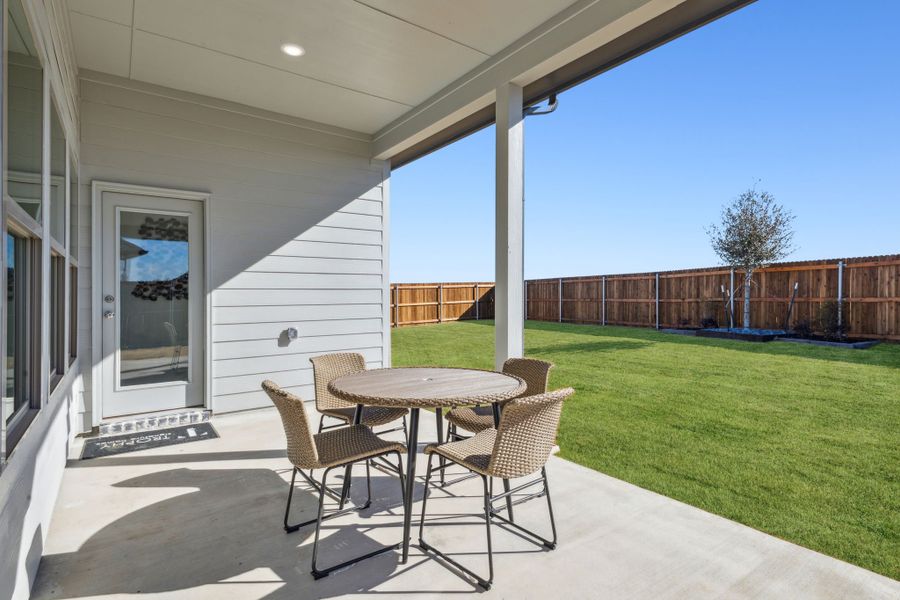 Covered Patio in the Diamond home plan by Trophy Signature Homes