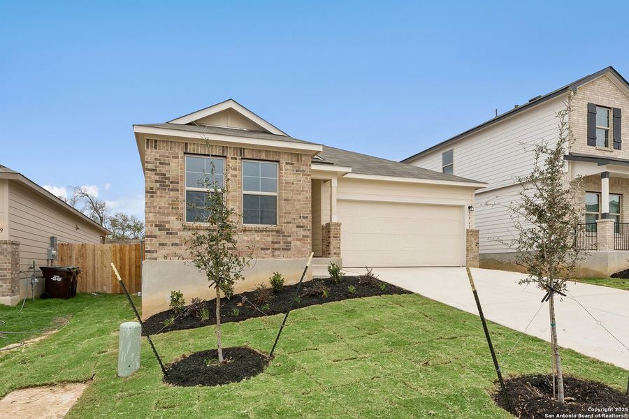 Front exterior of a new home in Agave, San Antonio, TX, highlighting curb appeal (Image 2). Front exterior of a new home in Agave, San Antonio, TX, highlighting curb appeal (Image 2).