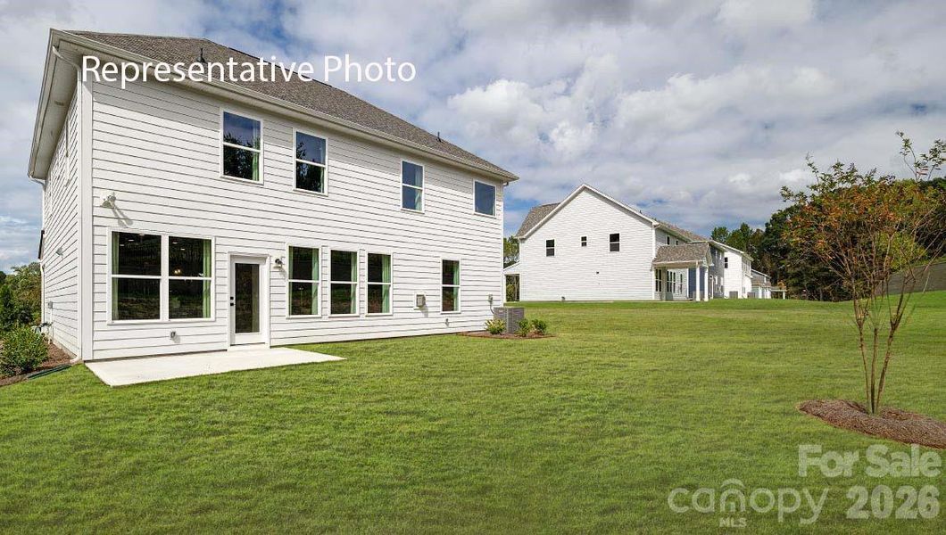 Exterior details and patio area of a home in Sylvan Creek, Denver (Image 21).
