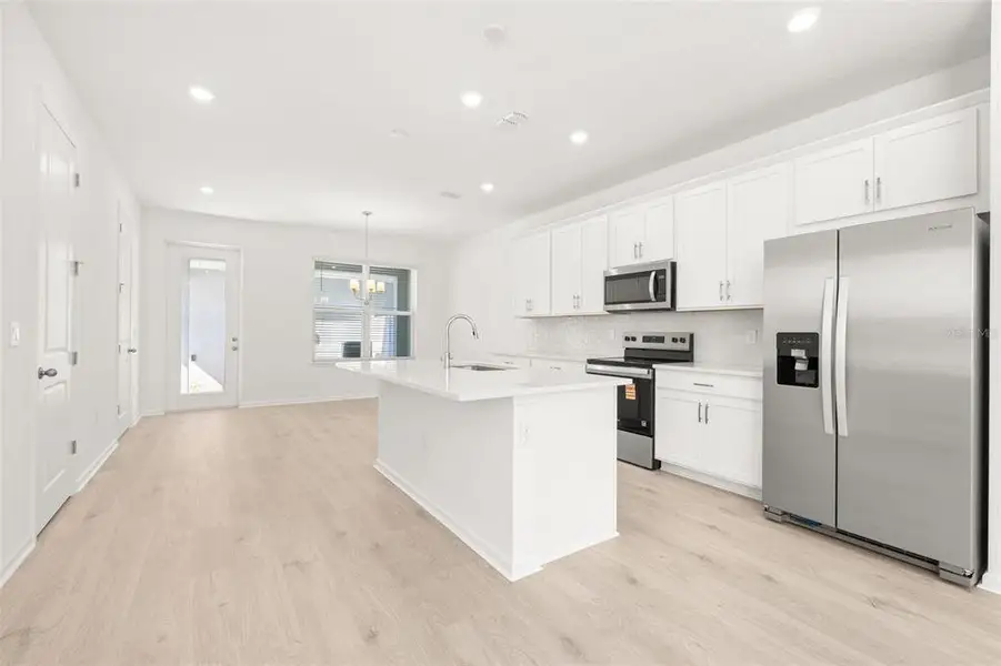 Furnished interior view inside a new home in Serenade at Ovation, Winter Garden (Image 5). Furnished interior view inside a new home in Serenade at Ovation, Winter Garden (Image 5).