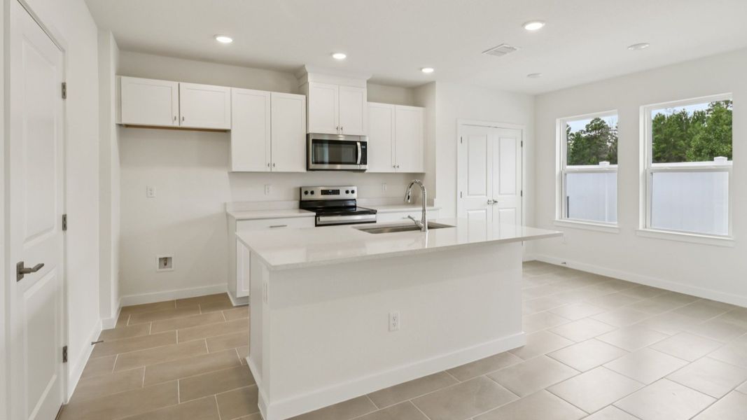Furnished interior view inside a new home in Cyrene at Harmony, St. Cloud (Image 10). Furnished interior view inside a new home in Cyrene at Harmony, St. Cloud (Image 10).