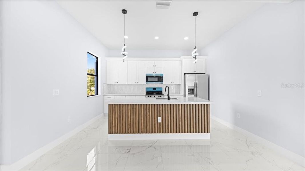 Furnished interior view inside a new home in , Cape Coral (Image 6).