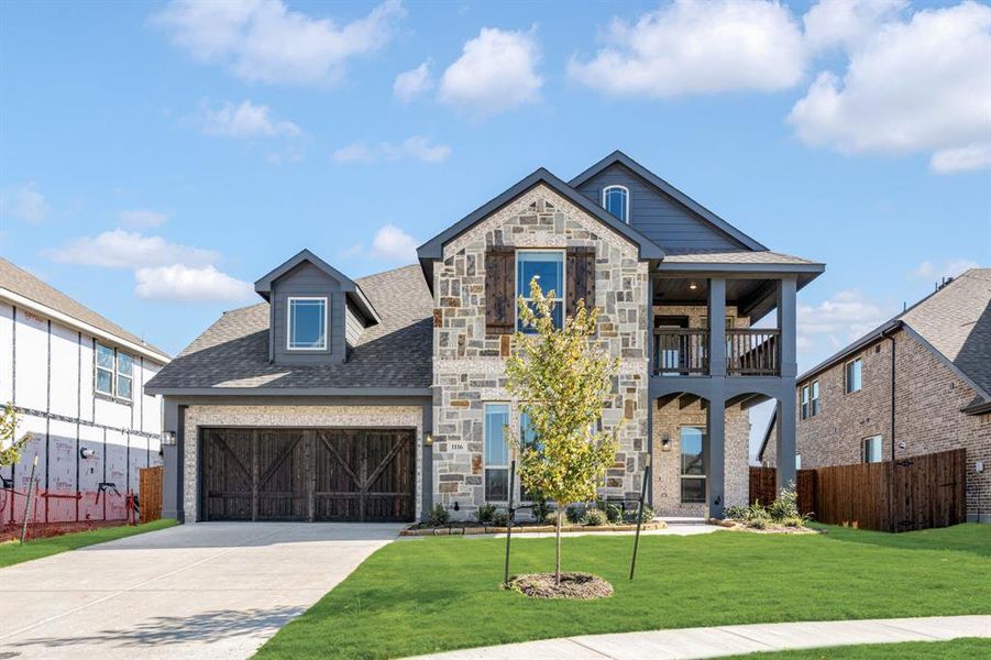 Front exterior of a new home in The Oaks, Red Oak, TX, highlighting curb appeal (Image 1). Front exterior of a new home in The Oaks, Red Oak, TX, highlighting curb appeal (Image 1).