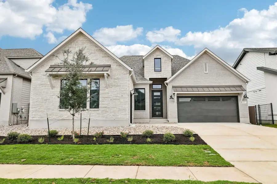 Representative exterior photo of a completed home built from the Allendale by Taylor Morrison in Easton Park, Austin, TX (Image 23).