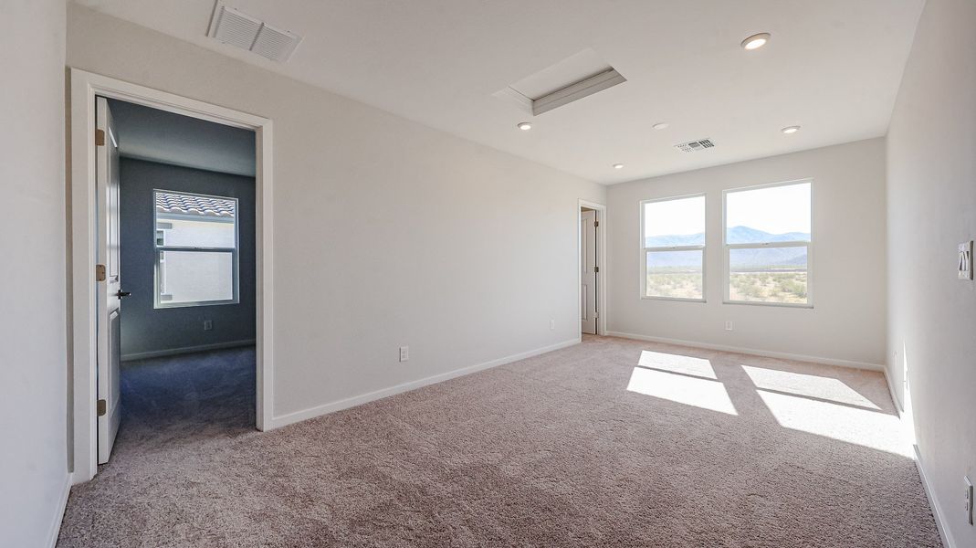 A room with a door and windows.